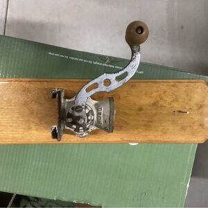 Coffee grinder handle on board